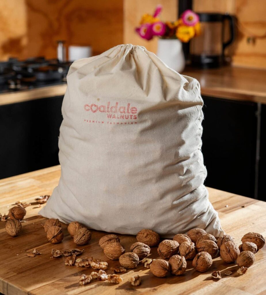 Bag of In-shell walnuts sitting on table