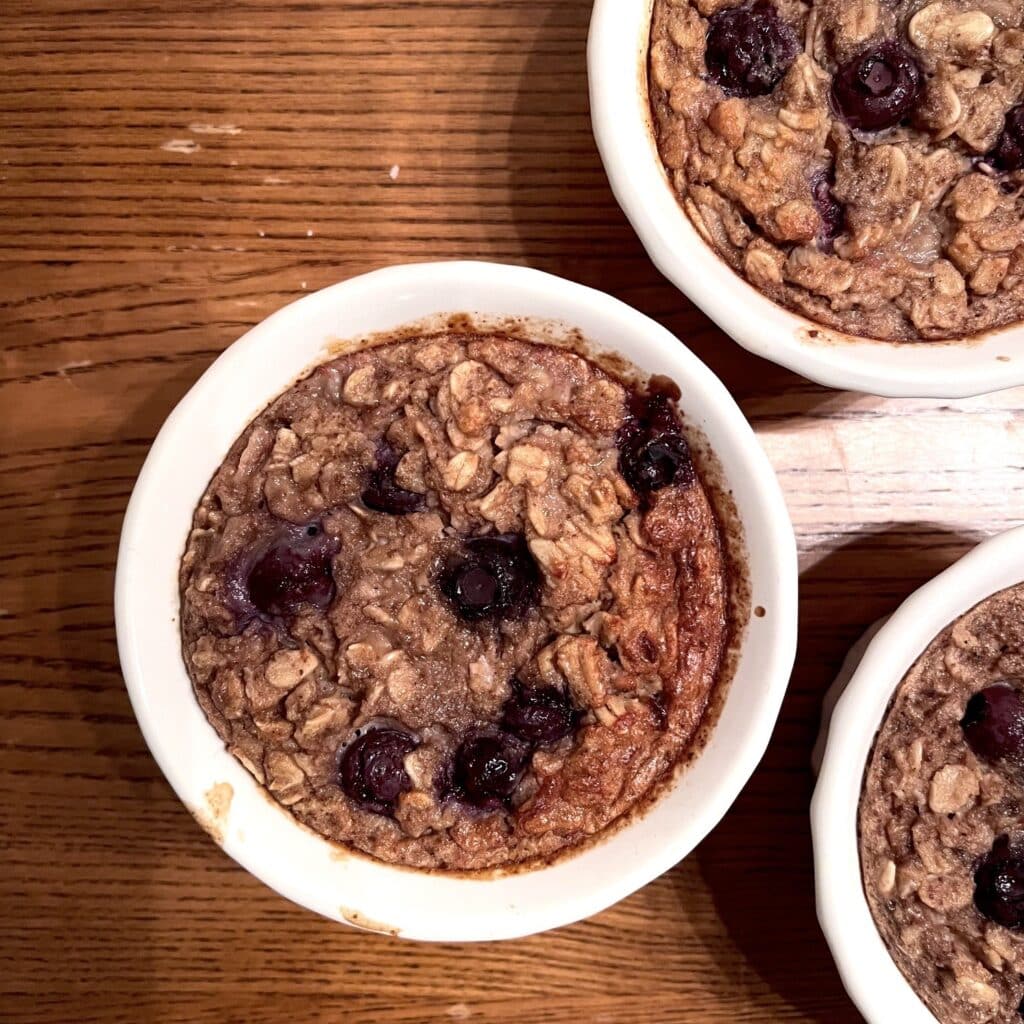 Walnut, banana and blueberry baked oats in bowl