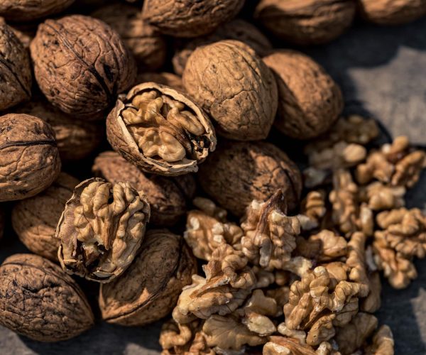 Vina walnuts in and out of the shells